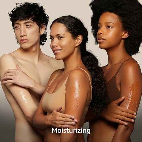 Three people with moisturized skin, diverse backgrounds.