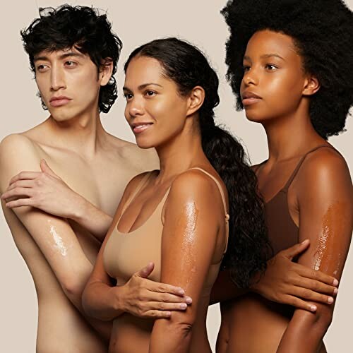 Three people with diverse skin tones applying moisturizer.