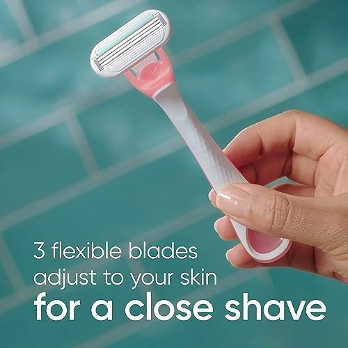 Hand holding a razor with text '3 flexible blades adjust to your skin for a close shave'.